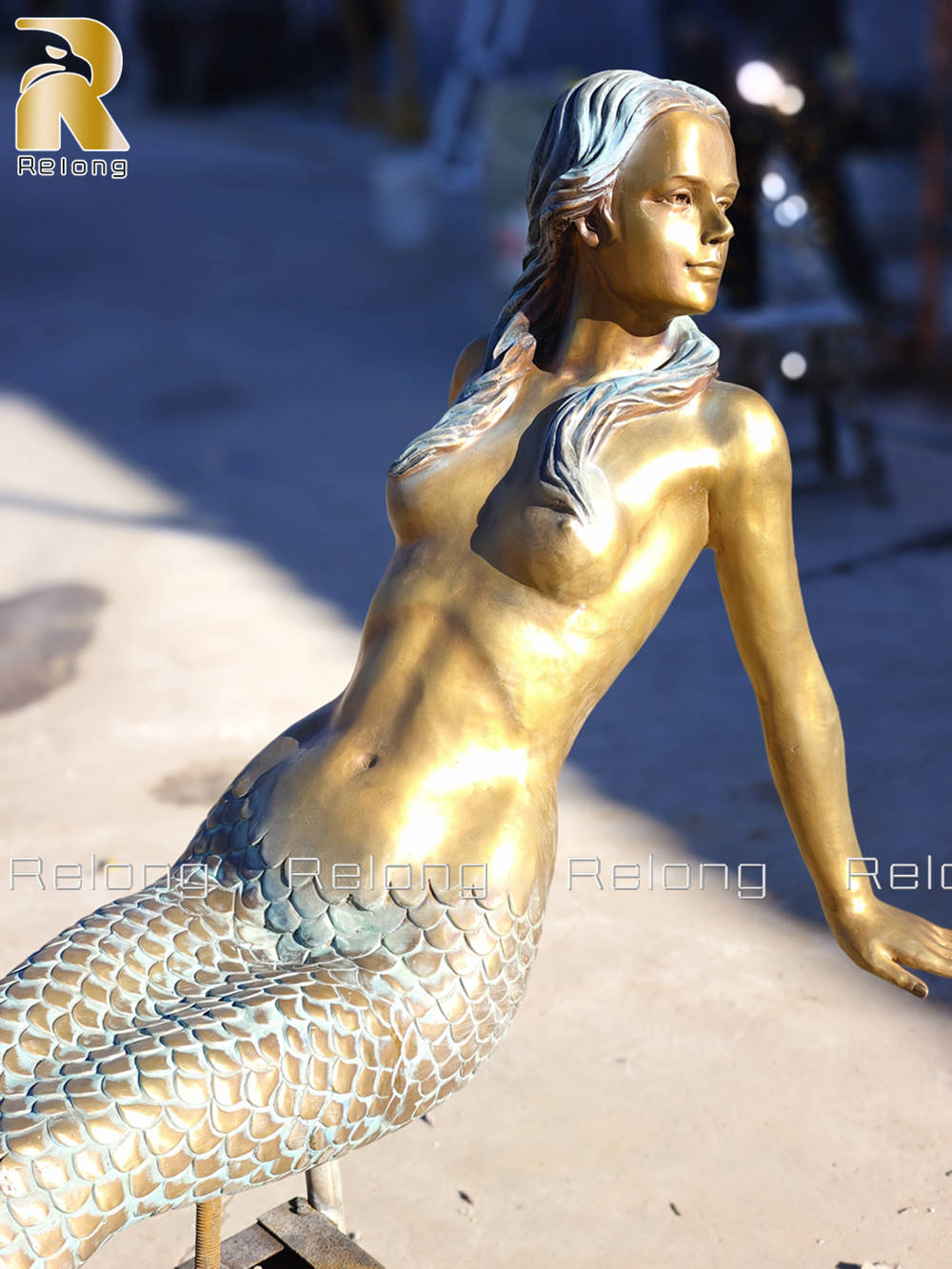 sitting mermaid statue details