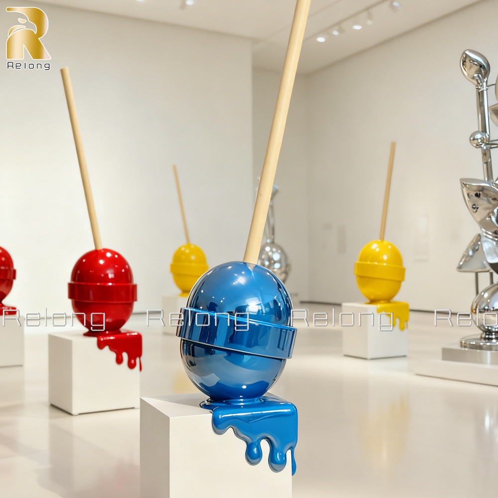 melting lollipop sculpture in different colors