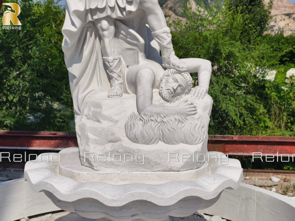 details of St. Michael statue on the fountain