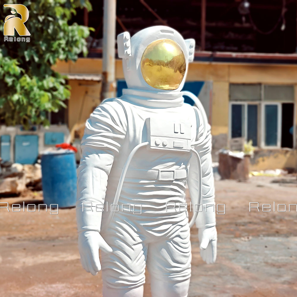 white bronze astronaut sculpture