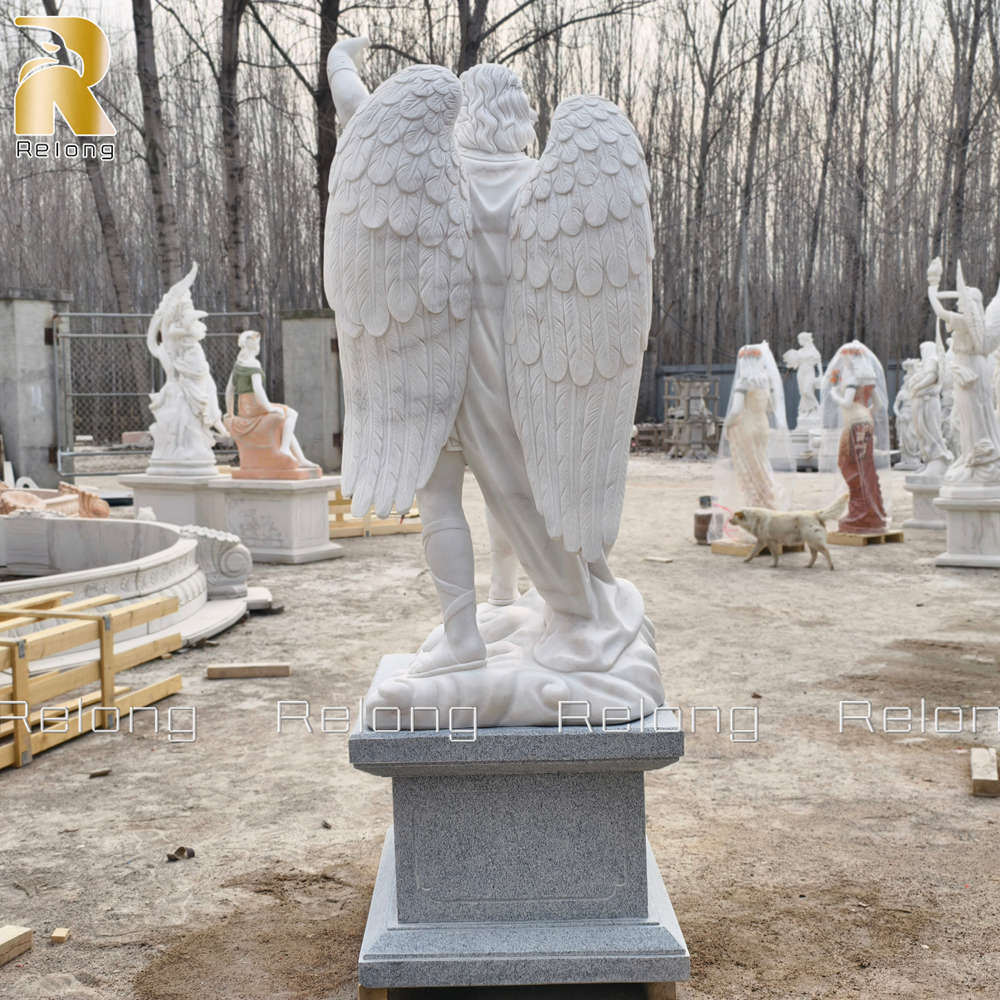 back details of angel holding sword statue