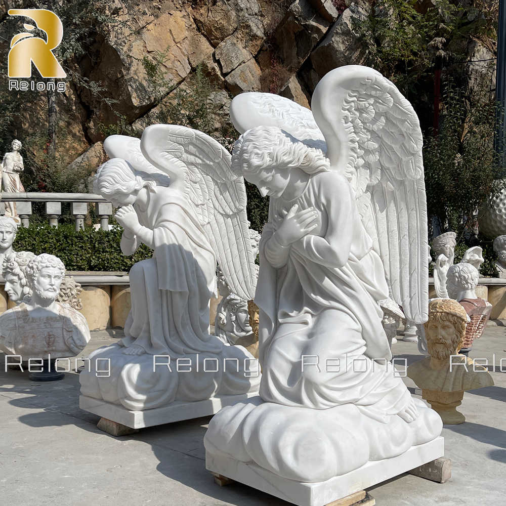 hand carved kneeling angel sculpture