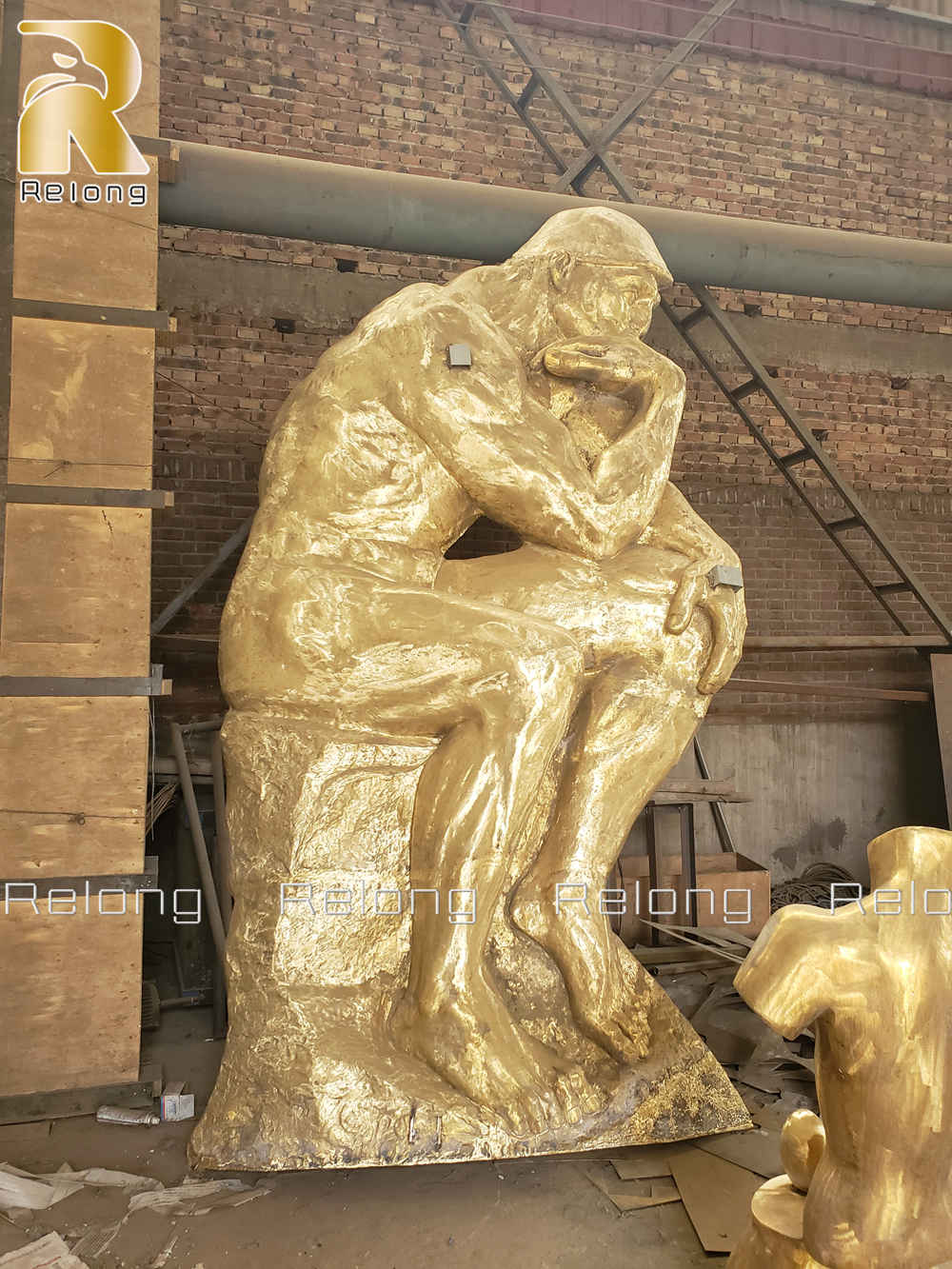welded bronze thinker statue