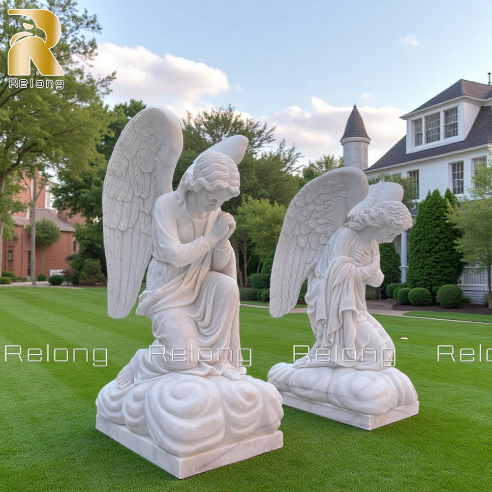 white kneeling angel sculpture