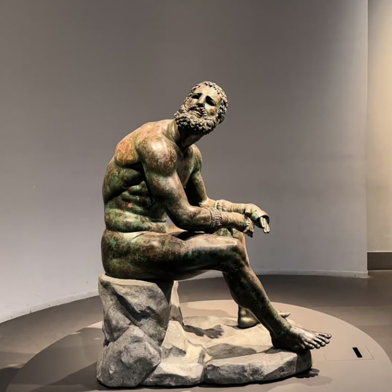 famous Bronze Boxer at Rest Sculpture