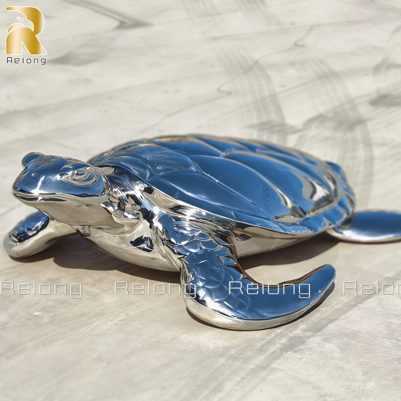 mirror metal sea turtle sculpture