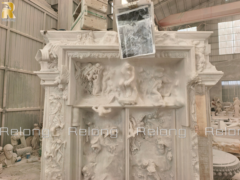 carving details of marble replica of “The Gates of Hell”