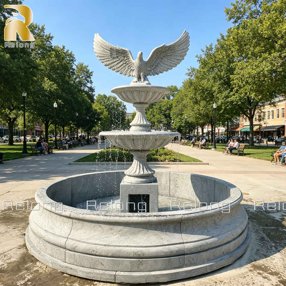 marble tiered fountain with eagle statue
