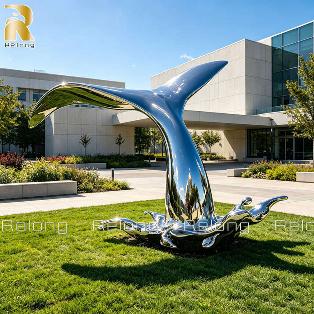 mirror polished whale tail sculpture