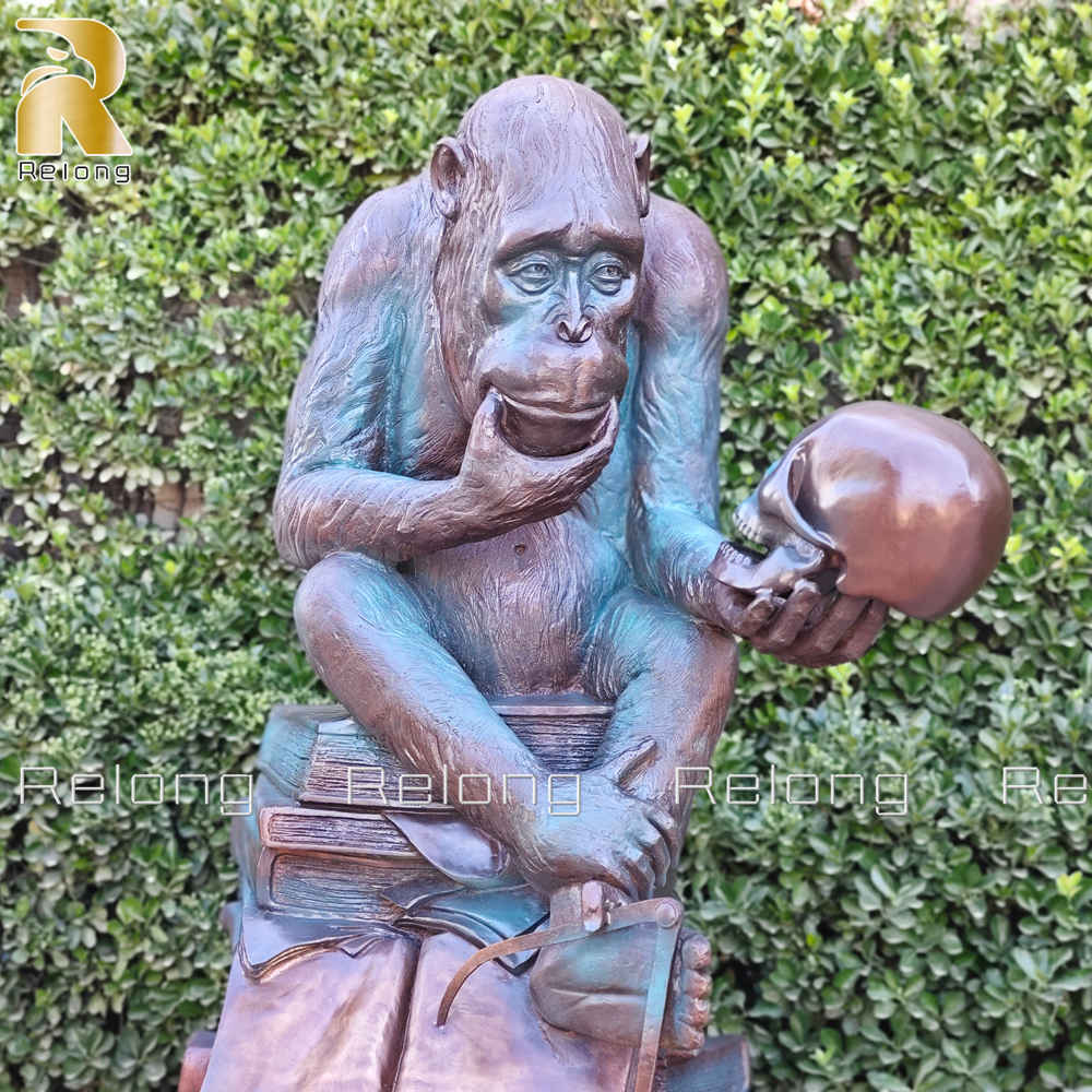 monkey holding skull statue details