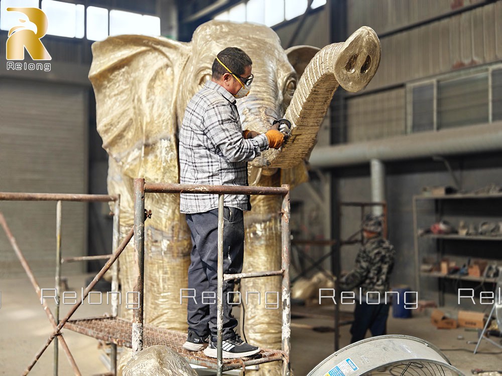 Polishing process of the large African elephant statue