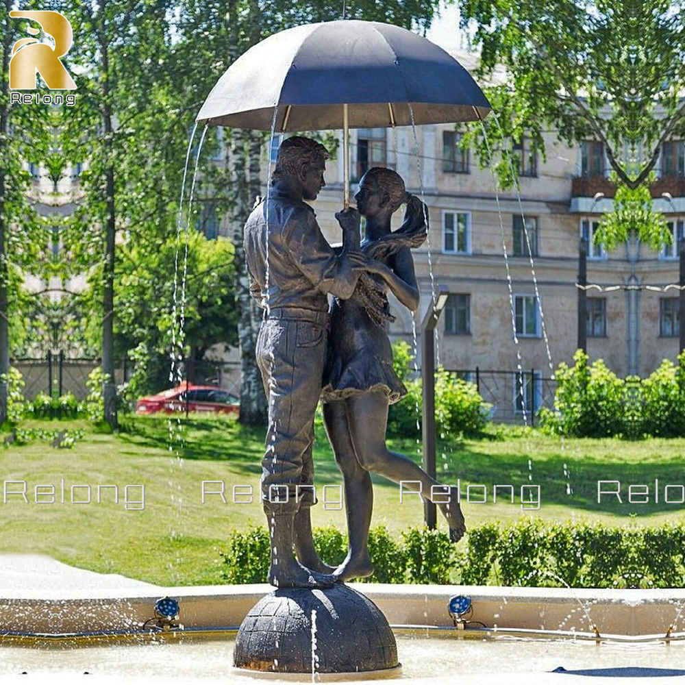 couple embracing under an umbrella sculpture for outdoor decor