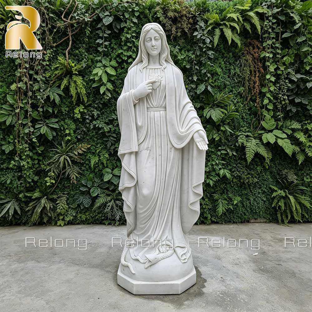 marble Immaculate Heart of Mary statue pointing to heart