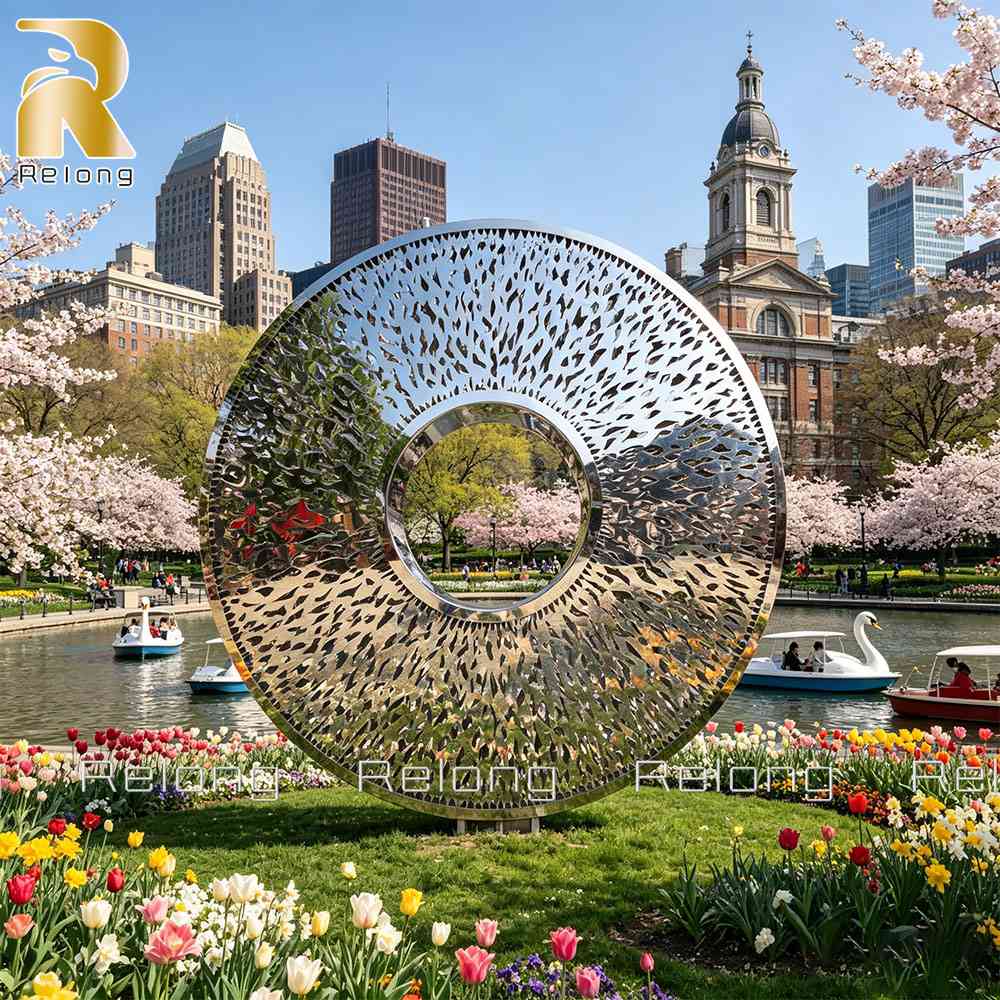 Stainless steel torus sculpture installed as public art