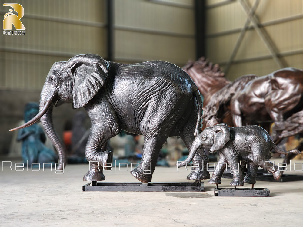 mother elephant and calf sculpture