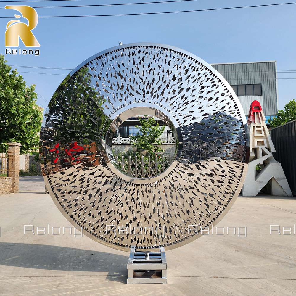 Mirror polished stainless steel torus sculpture