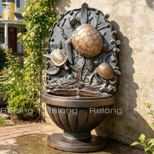 three turtle wall fountain