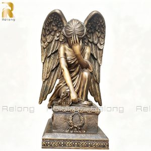 bronze kneeling angel statue