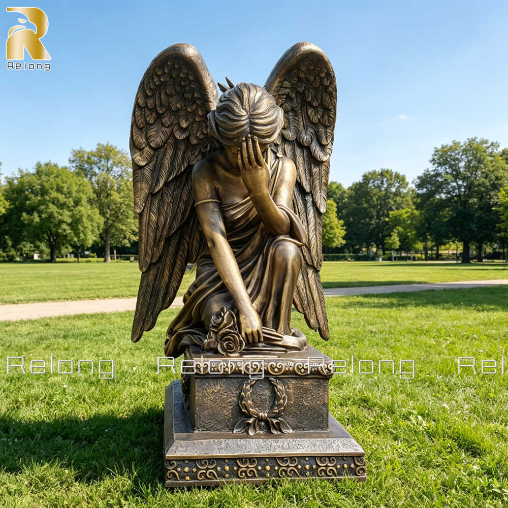 kneeling angel statue