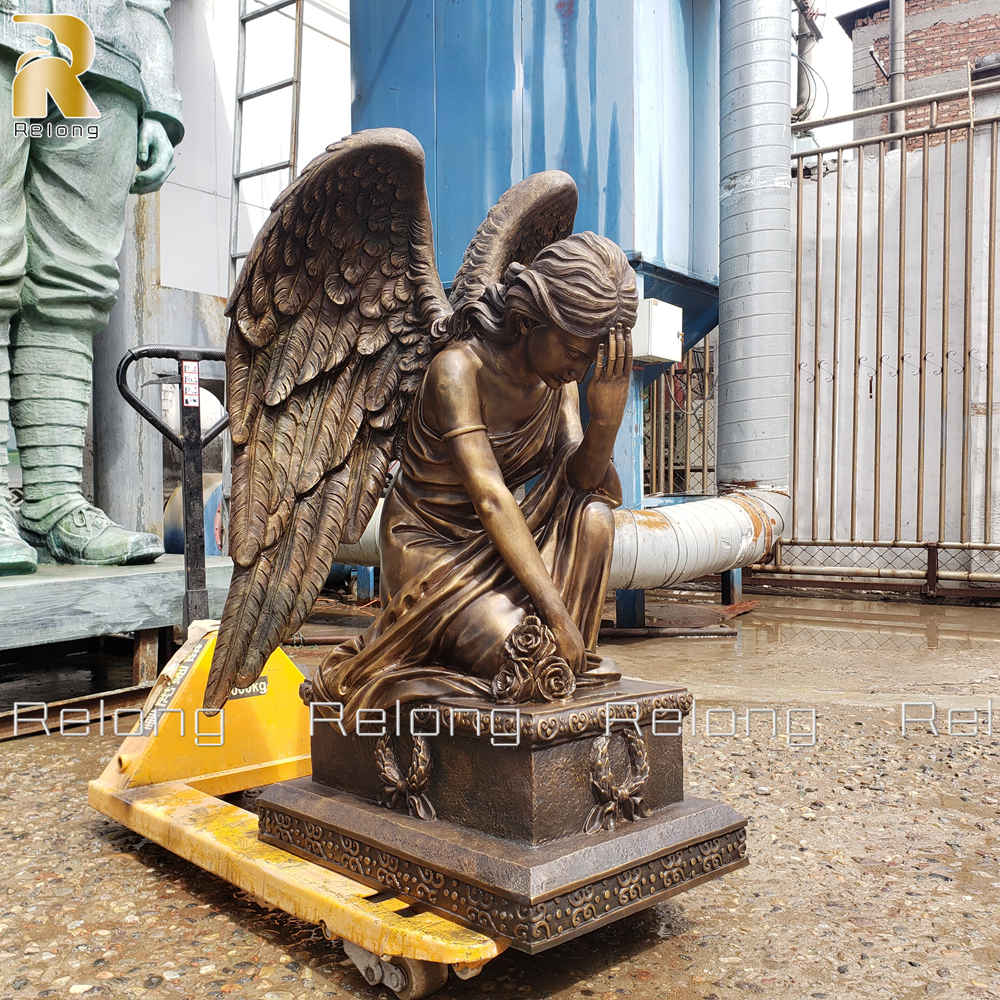 kneeling angel statue details