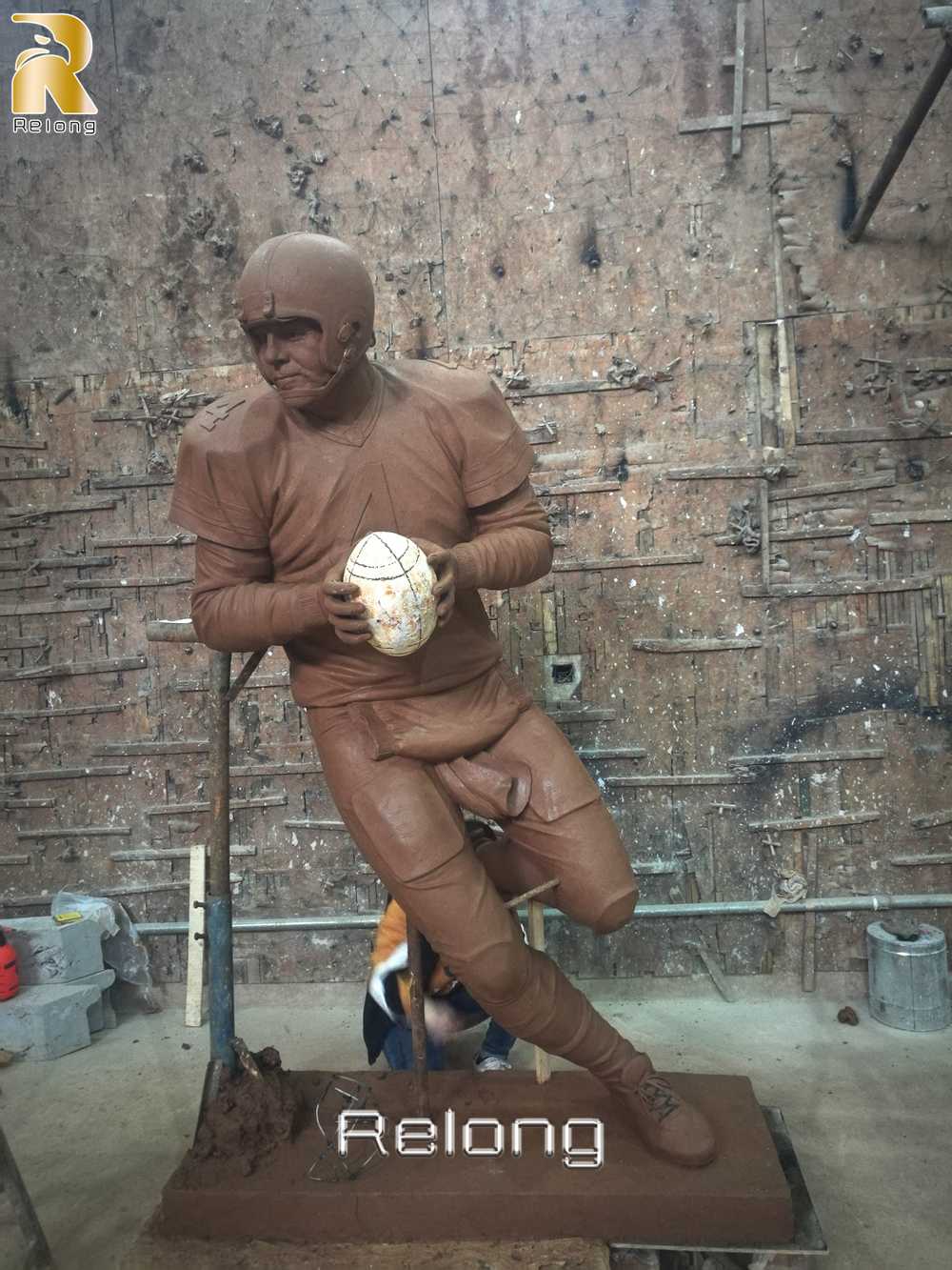 bronze rugby player statue clay modeling