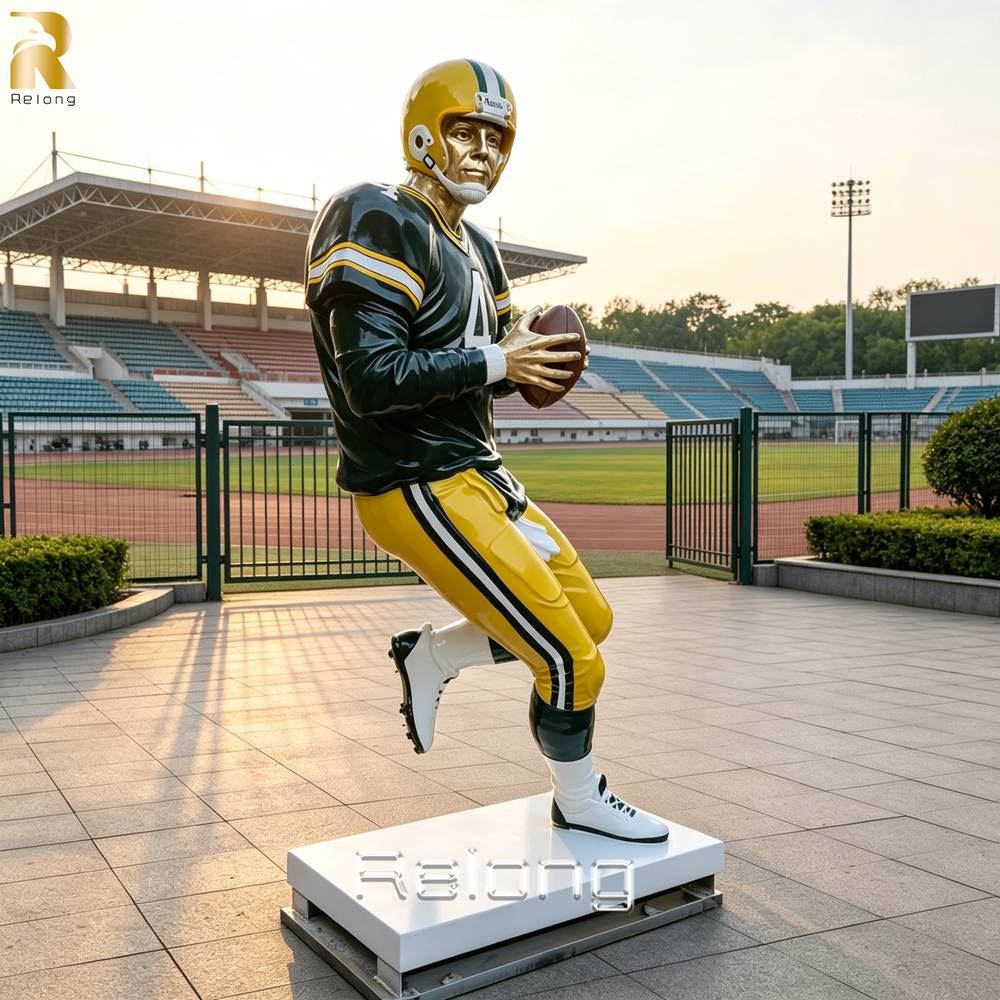 bronze rugby player statue outdoor installation