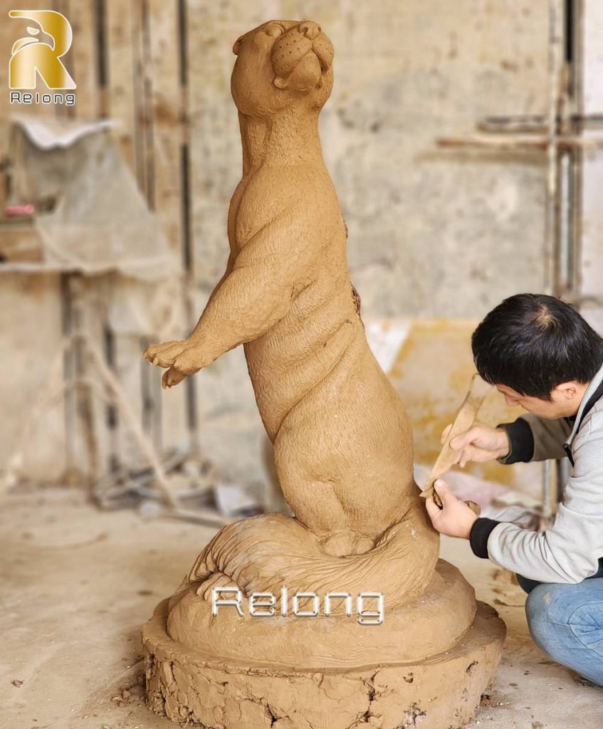 clay model for custom bronze otter sculpture