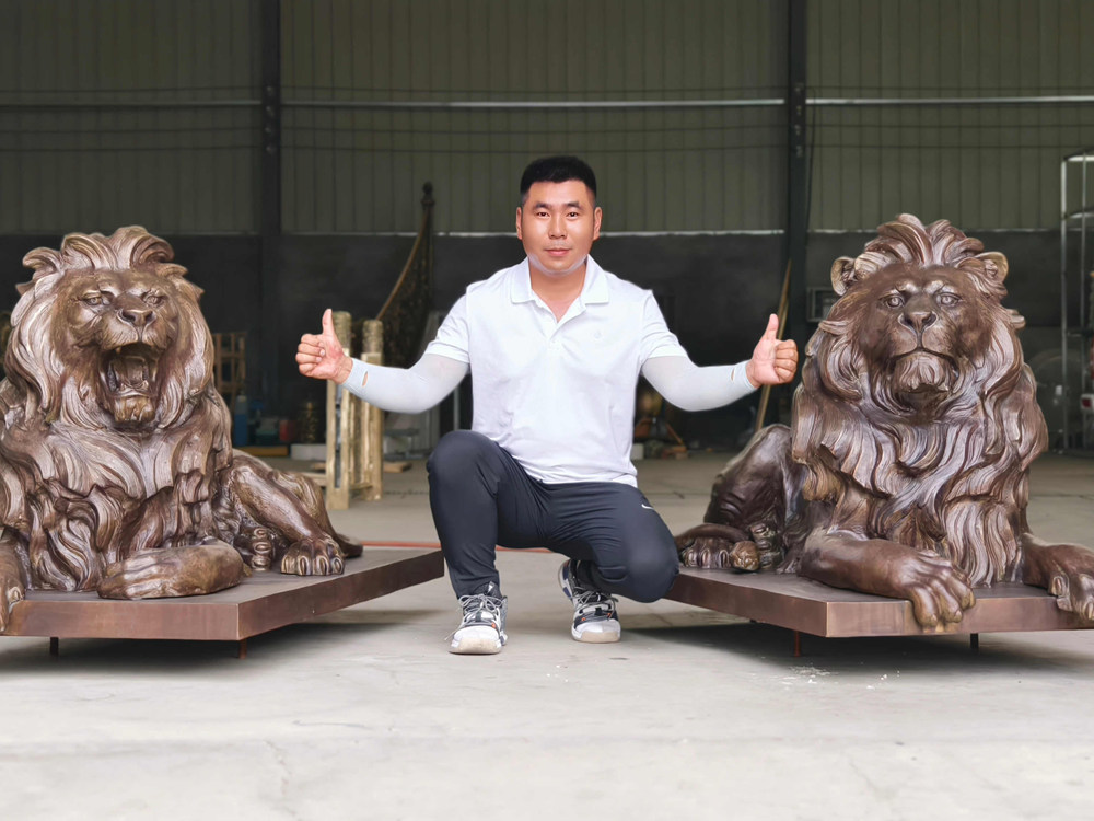 bronze lying lion sculptures