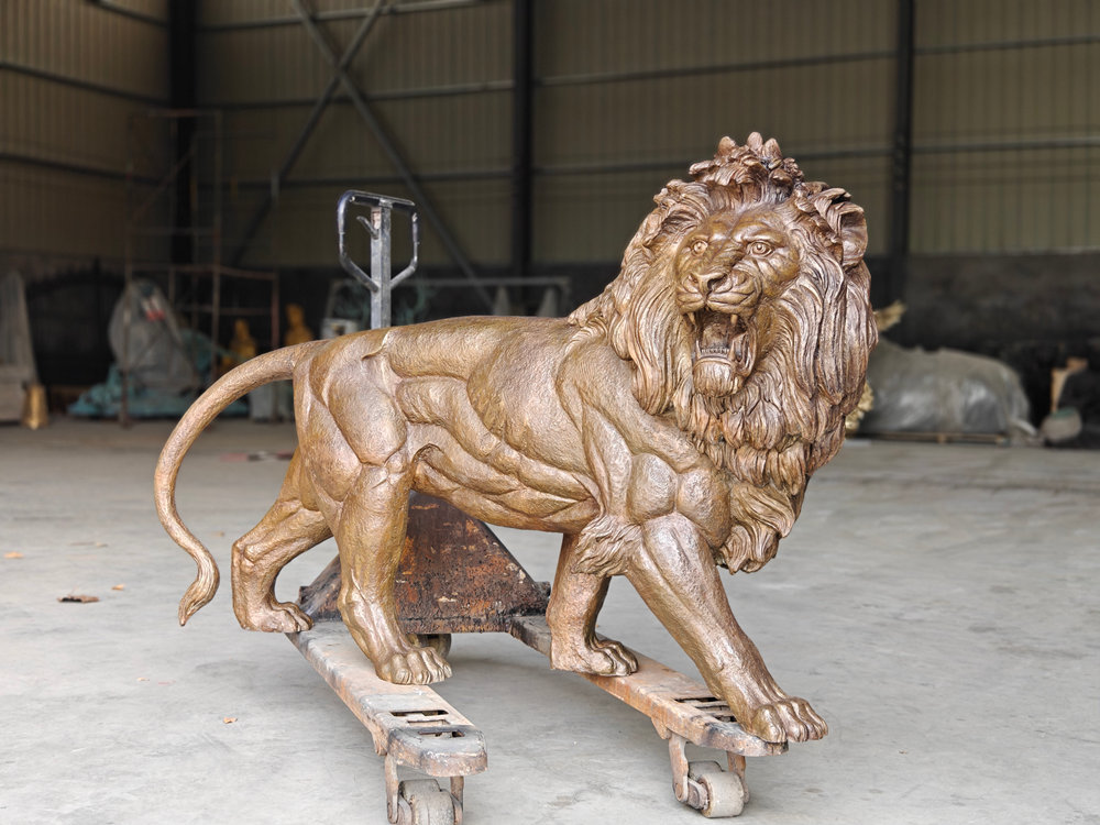 bronze walking lion