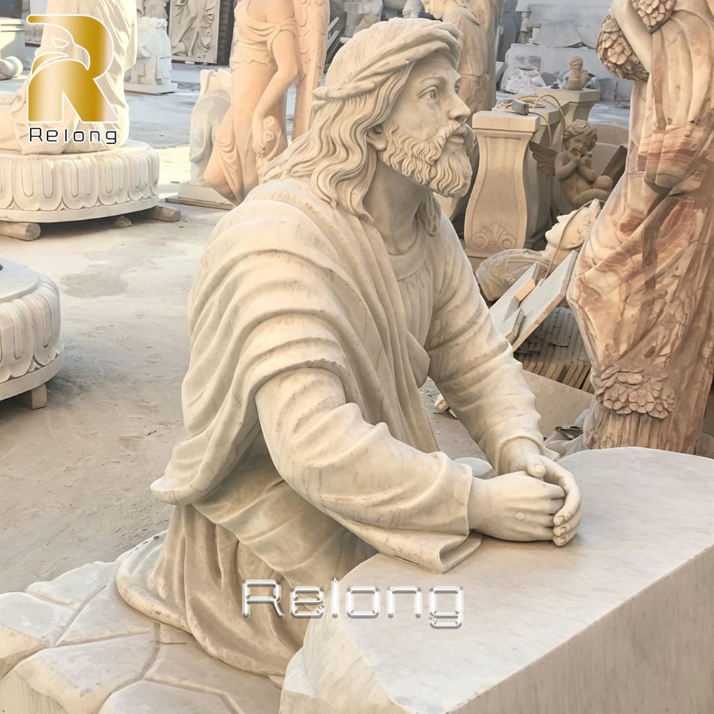 marble praying jesus statue outdoor