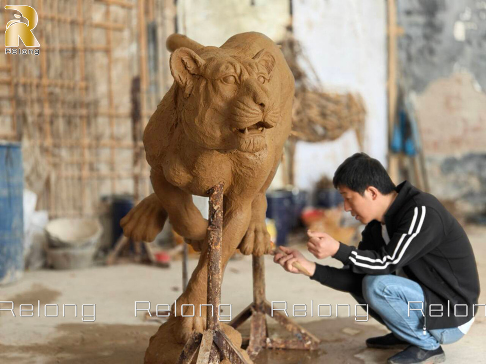 the clay model of the jaguar statue