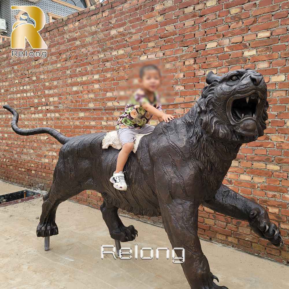 child riding black tiger statue