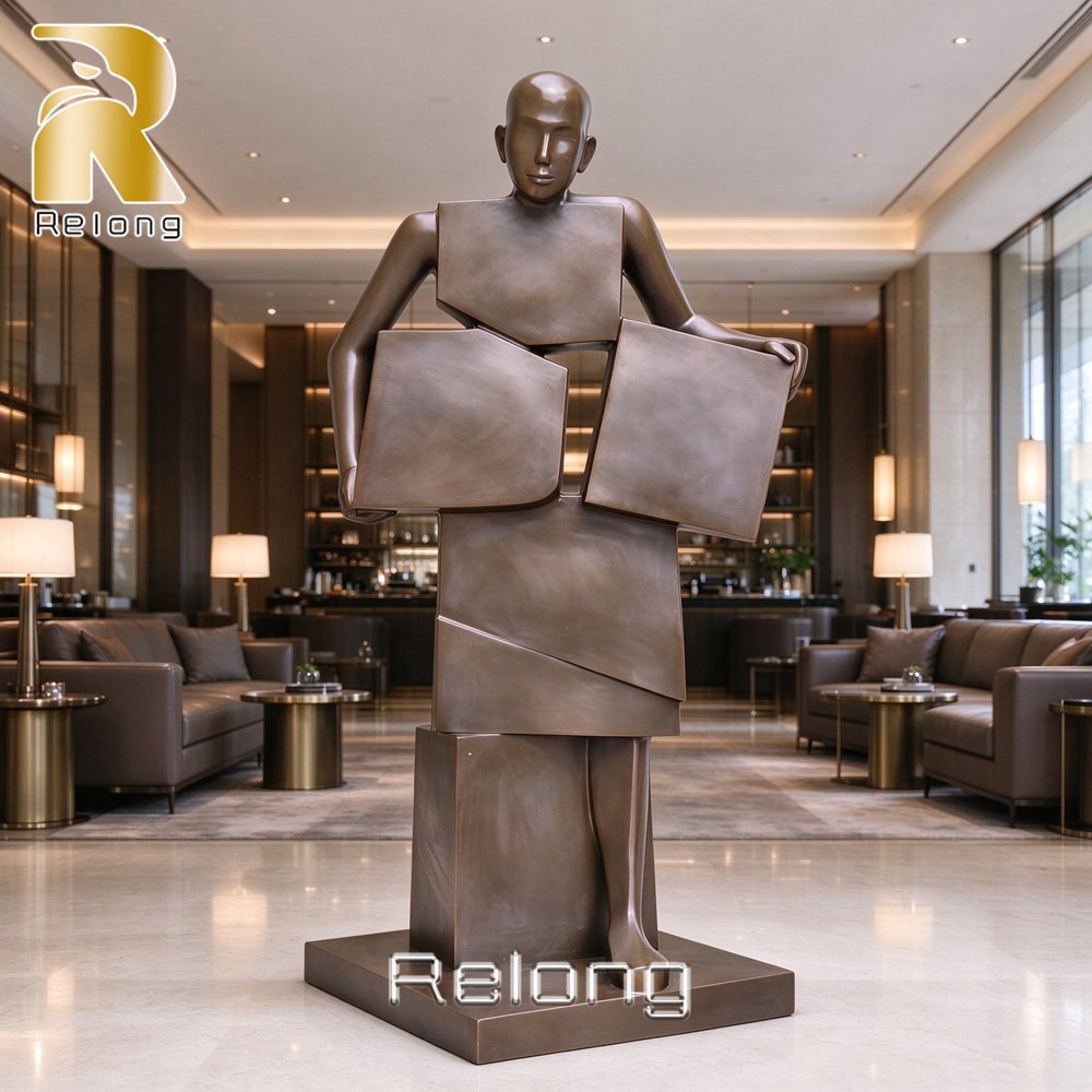 abstract geometric bronze man sculpture